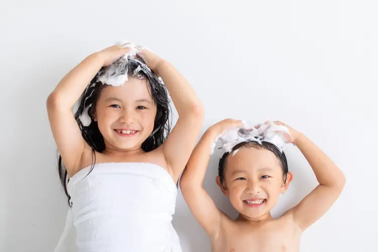 child washing hair