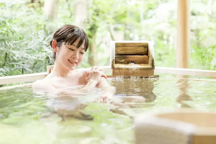 woman bathing in a hot spring